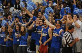 crowd cheering at a basketball game