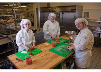 students cooking in a kitchen