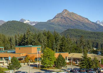 campus building with mountain backdrop