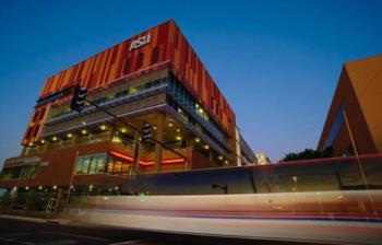 motion blur of a passing vehicle in front of ASU building