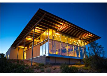 illuminated modern building at twilight