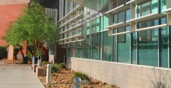 modern building with glass facade and walkway