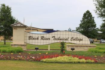 entrance sign of 'Black River Technical College' with landscaping