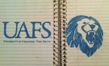 hand-drawn 'uafs' logo with a lion on lined notebook paper