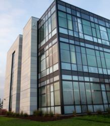 modern building with large windows and clear sky