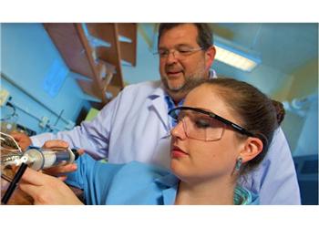 two scientists conducting research in a lab