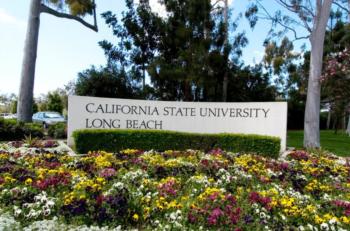 california state university long beach sign behind flowers