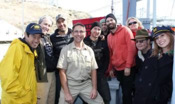 group of people smiling outdoors