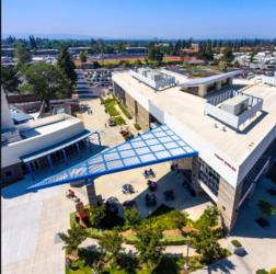 aerial view of college campus with walkways and trees