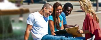 students with a tablet on campus