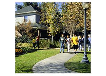 students walking on campus path