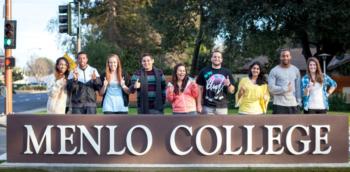 students by 'MENLO COLLEGE' sign