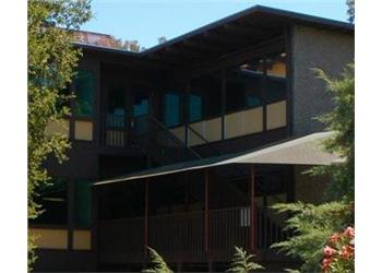 building with large glass windows and balcony