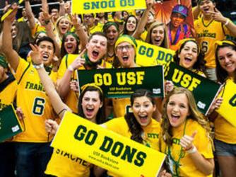 group of students cheering 'go usf go dons' at event