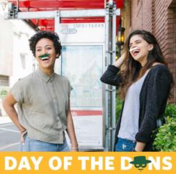 two students laughing 'day of the dons' with logo