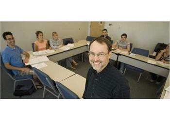 a professor and students in a classroom setting