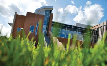 modern campus building with blue sky