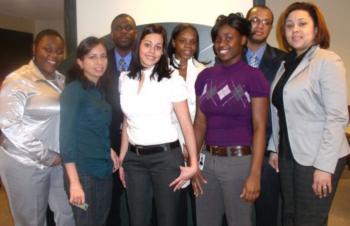 smiling students posing in academic setting