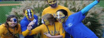 students with face paint showing school spirit