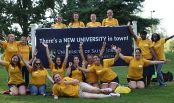 'new university in town' USJ banner with group