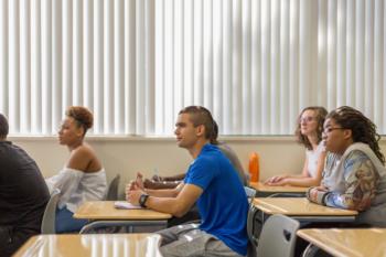 students attentively sitting in classroom