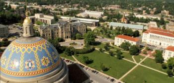 aerial view of a campus with a large dome