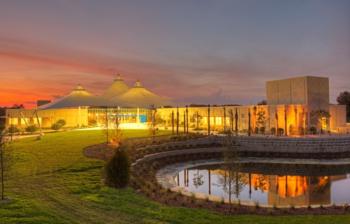 campus building at dusk with reflection