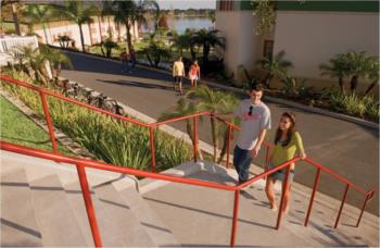 students descending outdoor stairs