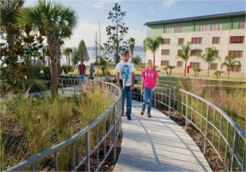 students walking on campus pathway