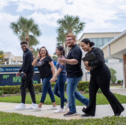 group of students walking on campus