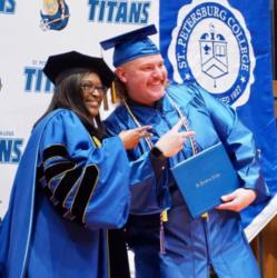 graduates posing at 'st. petersburg college' commencement ceremony