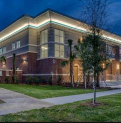 illuminated building exterior at dusk