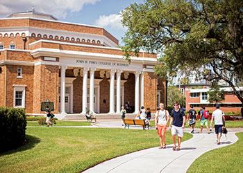 students walking near sykes college of business