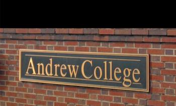 sign with 'Andrew College' on a brick wall