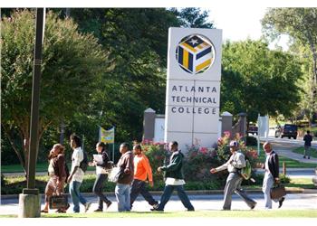 students walking by atlanta technical college sign