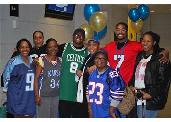 group in sports jerseys with balloons