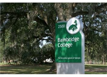 sign 'Bainbridge College The University System of Georgia' with trees