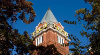 brick building with 'tech tower' text on the rooftop