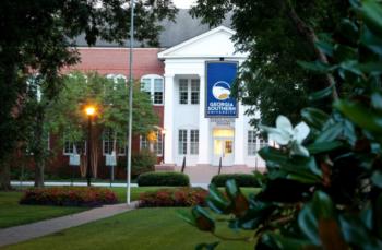 campus building with 'georgia southern university' banner