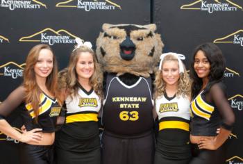 cheerleaders with 'kennesaw state' mascot