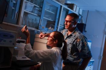 lab scene, two people working