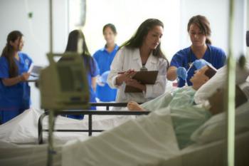 nursing students practicing in classroom