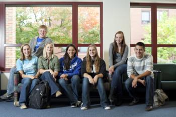 students sitting by window