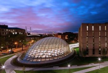 illuminated dome building at dusk with colorful sky