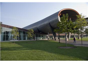 contemporary building with unique roof design