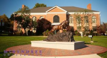 mckendree university with statue and building