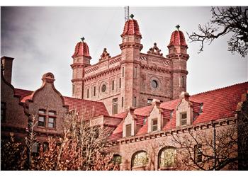 historic brick building with turrets