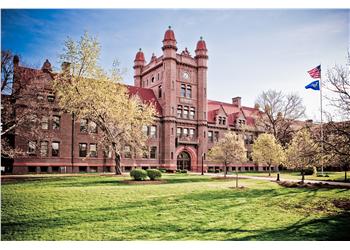 brick building with green lawn