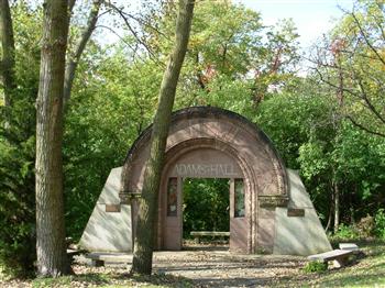 brick archway reading 'adams hall'