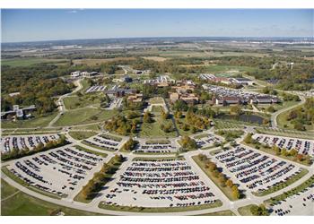 aerial view of a campus with parking lots